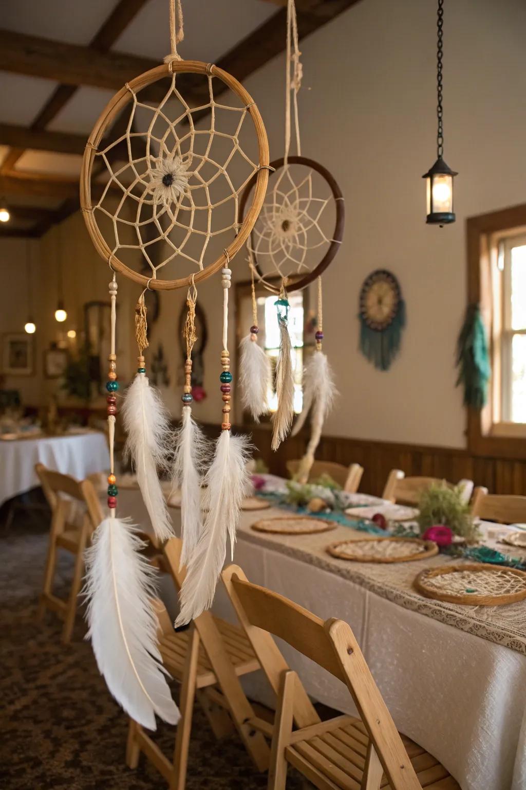 Dreamcatchers adding a bohemian touch to the countryside wedding setting.
