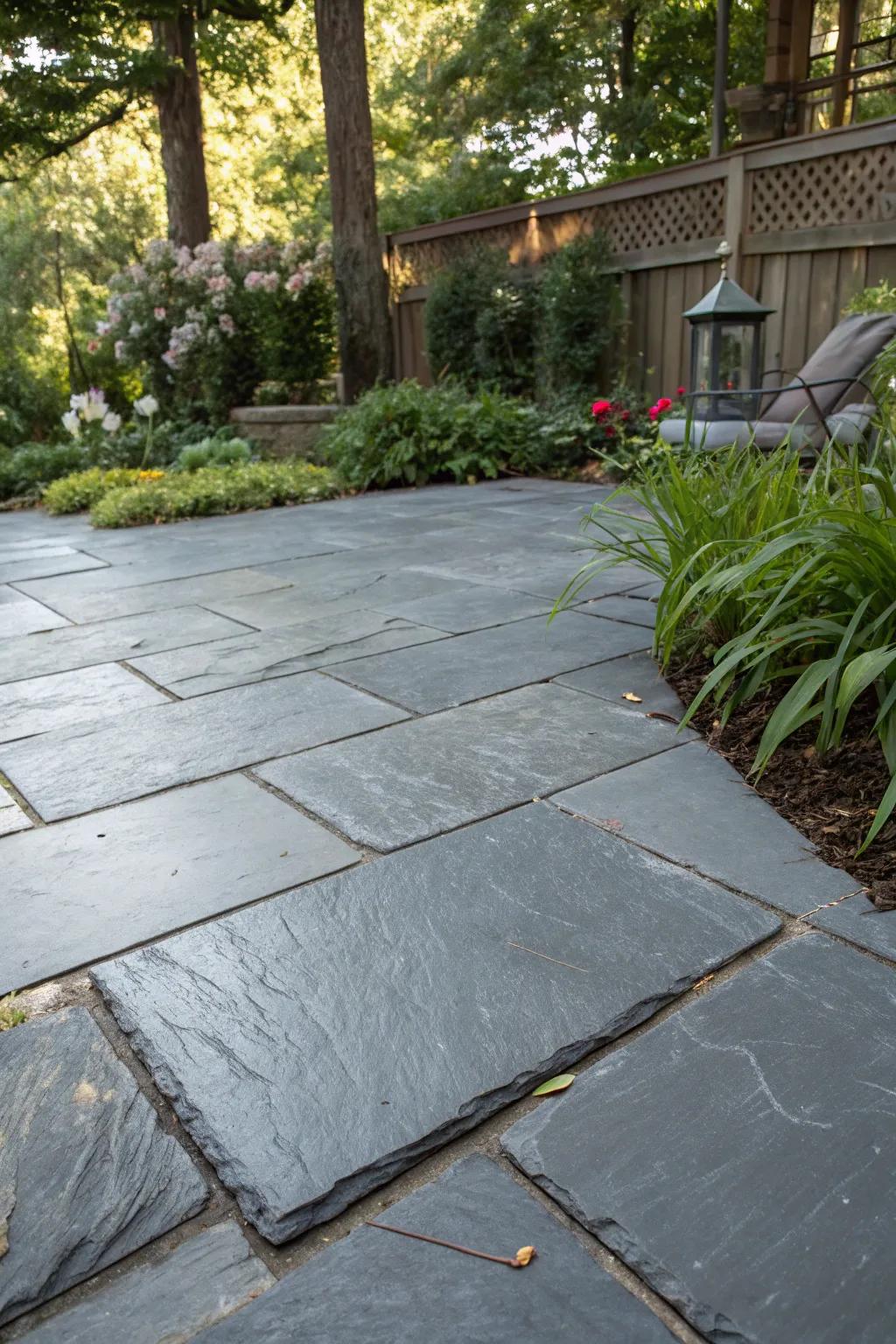 An eco-friendly slate patio utilizing recycled materials.