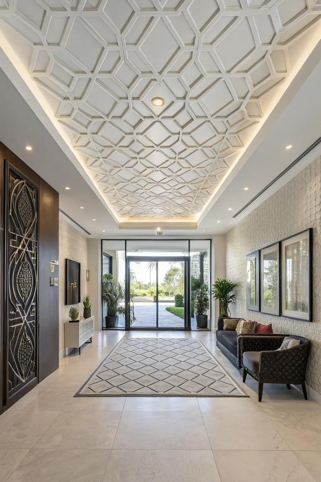 A modern entryway showcasing a geometric-patterned white ceiling, delivering a unique spin.