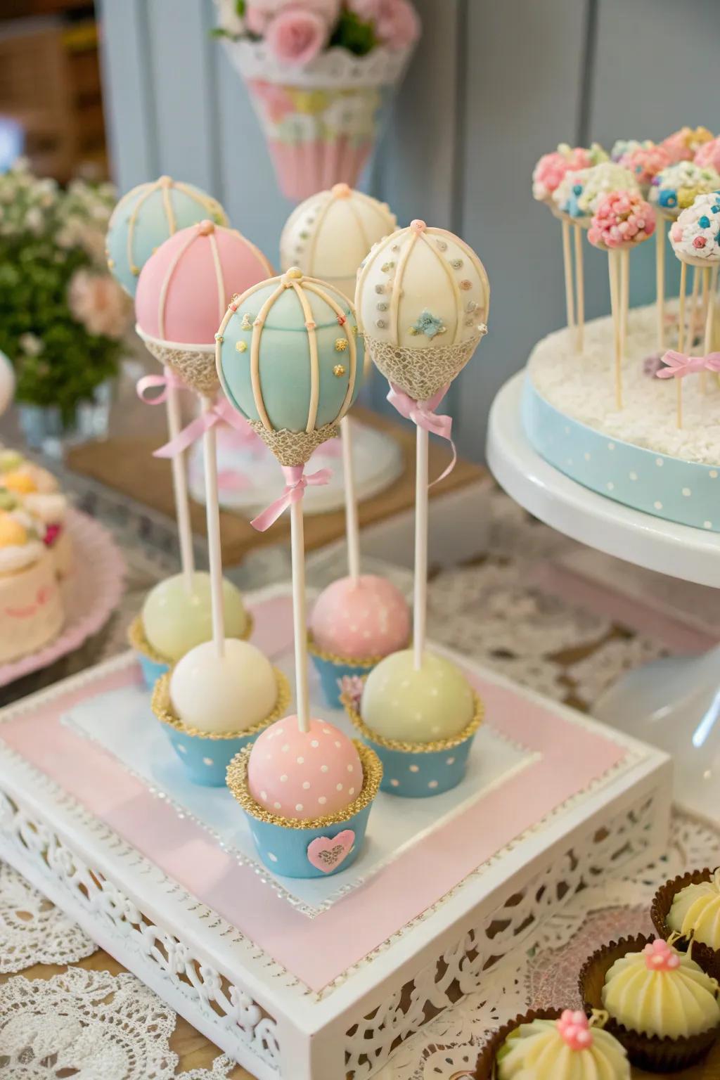 Delightful pastry lollipops resembling miniature hot air balloons.