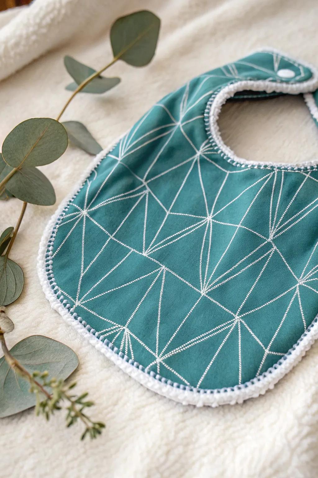 Handcrafted elegance for little ones: Discover the perfect blend of style and functionality with this beautifully crafted baby bib.