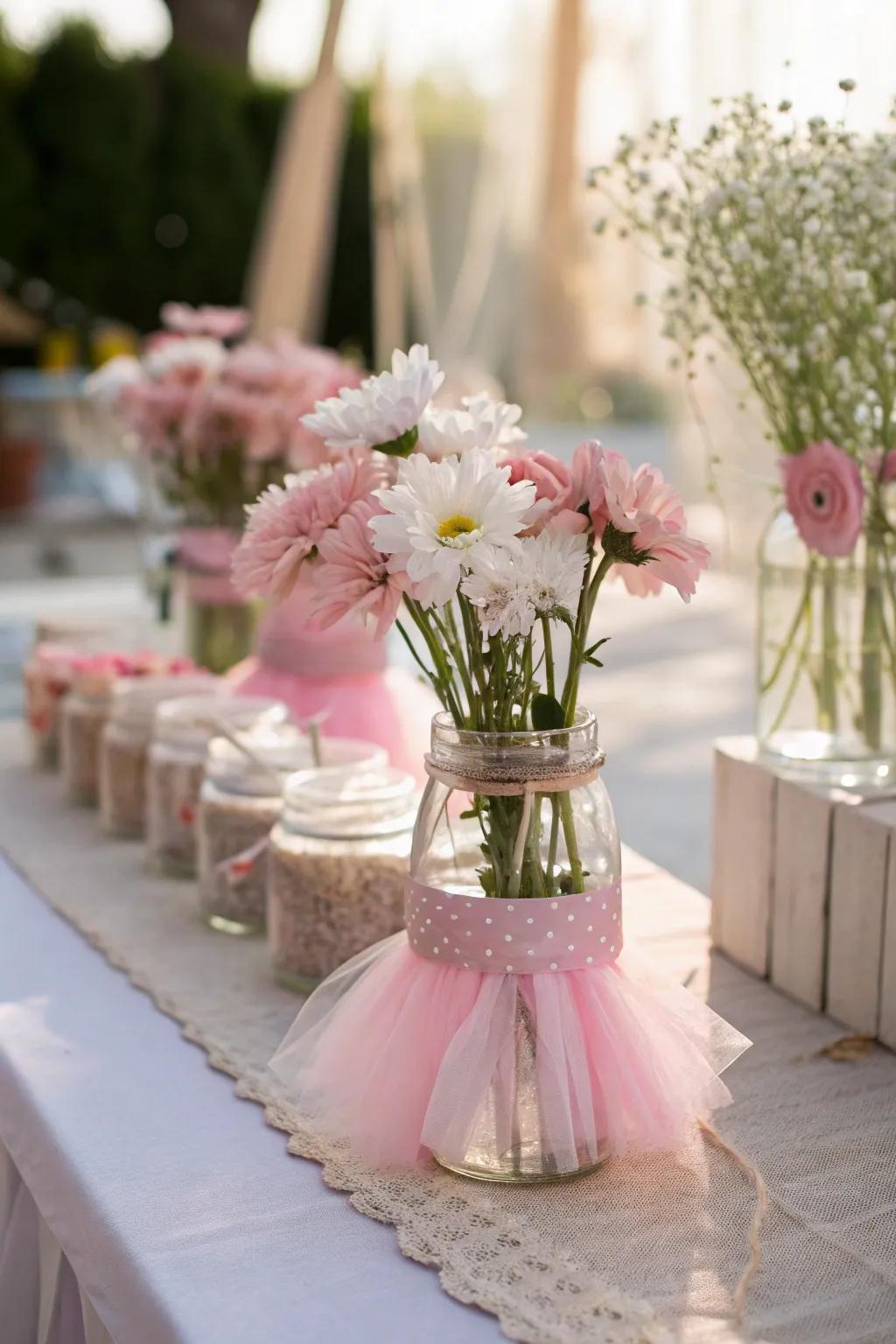 Whimsical centerpieces with little twirls and soft blooms.