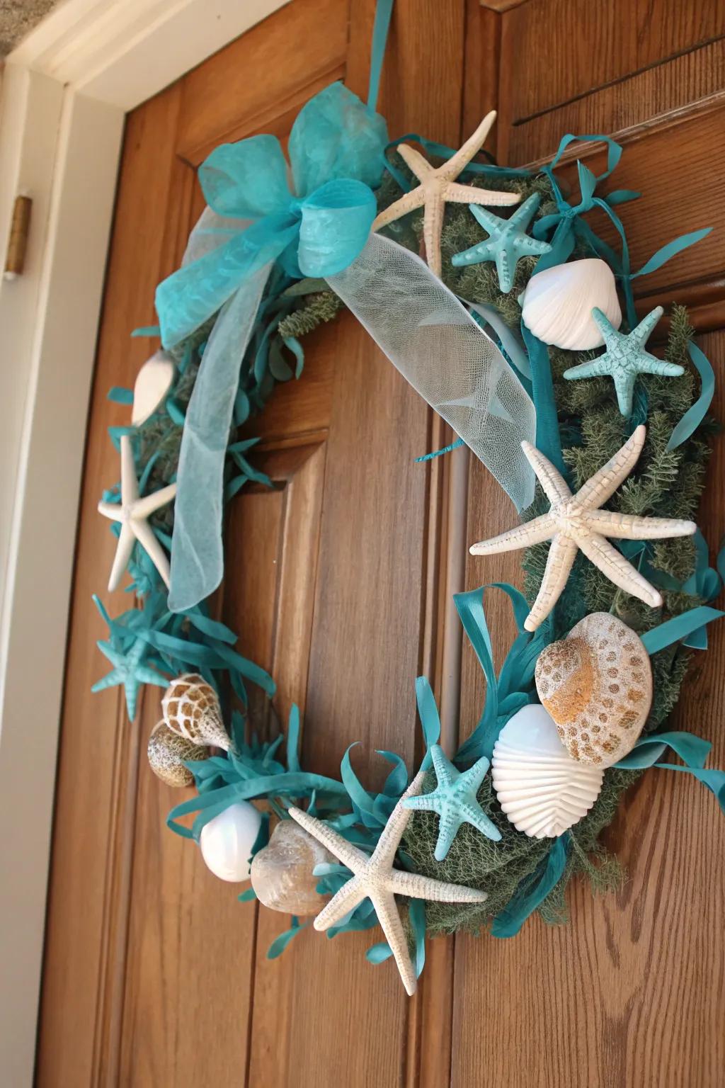 A maritime-themed wreath featuring starfish and turquoise elements, perfect for coastal residences.