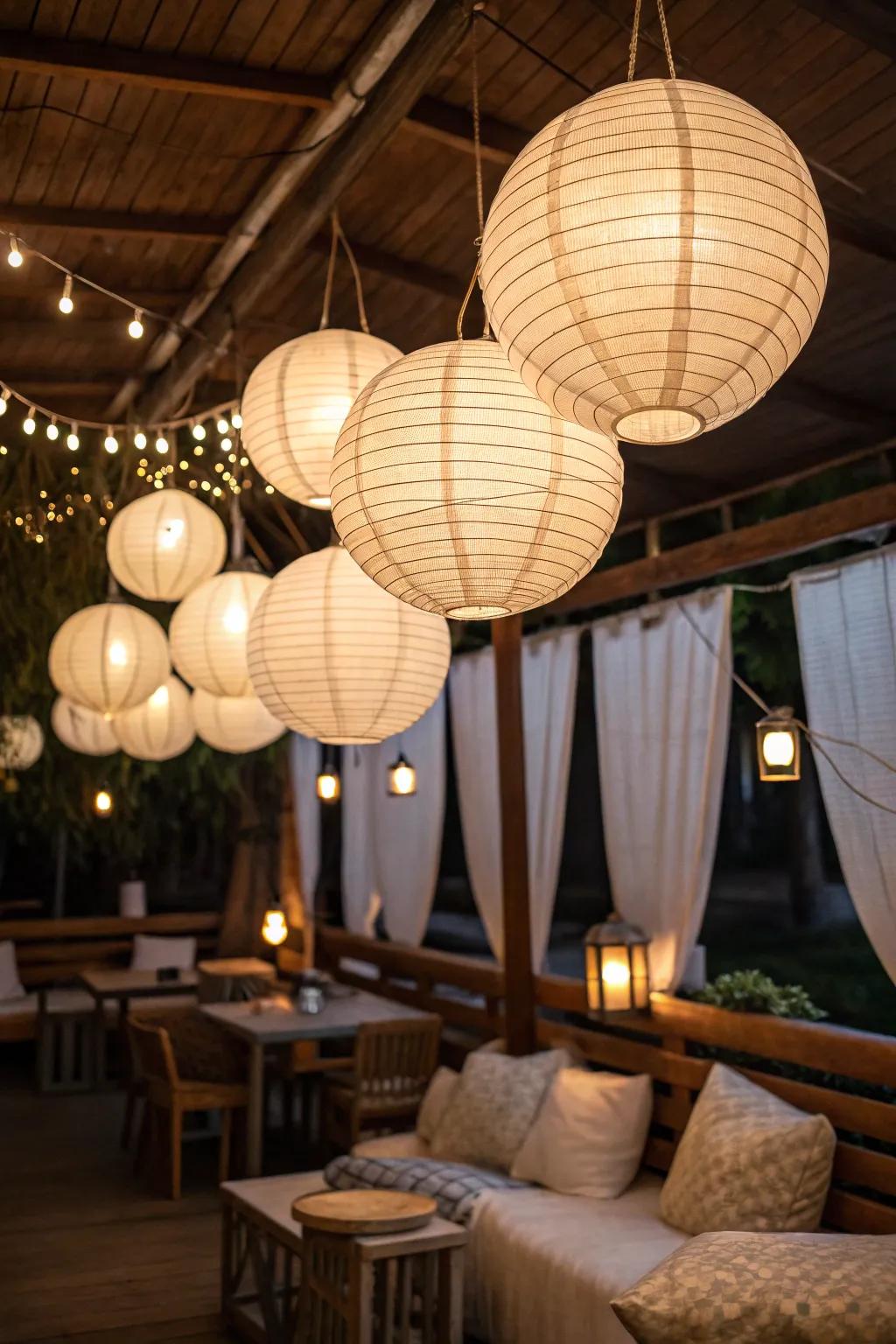 Textile globes produce a serene and dispersed illumination effect.