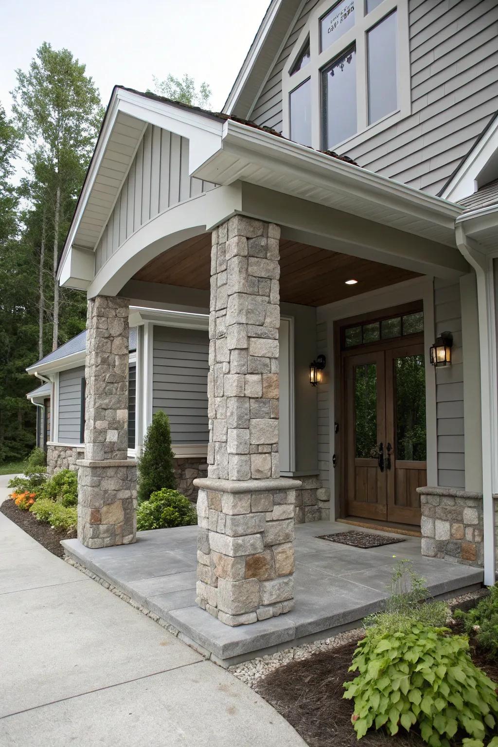 Majestic entrance featuring grey tones and artificial granite columns.