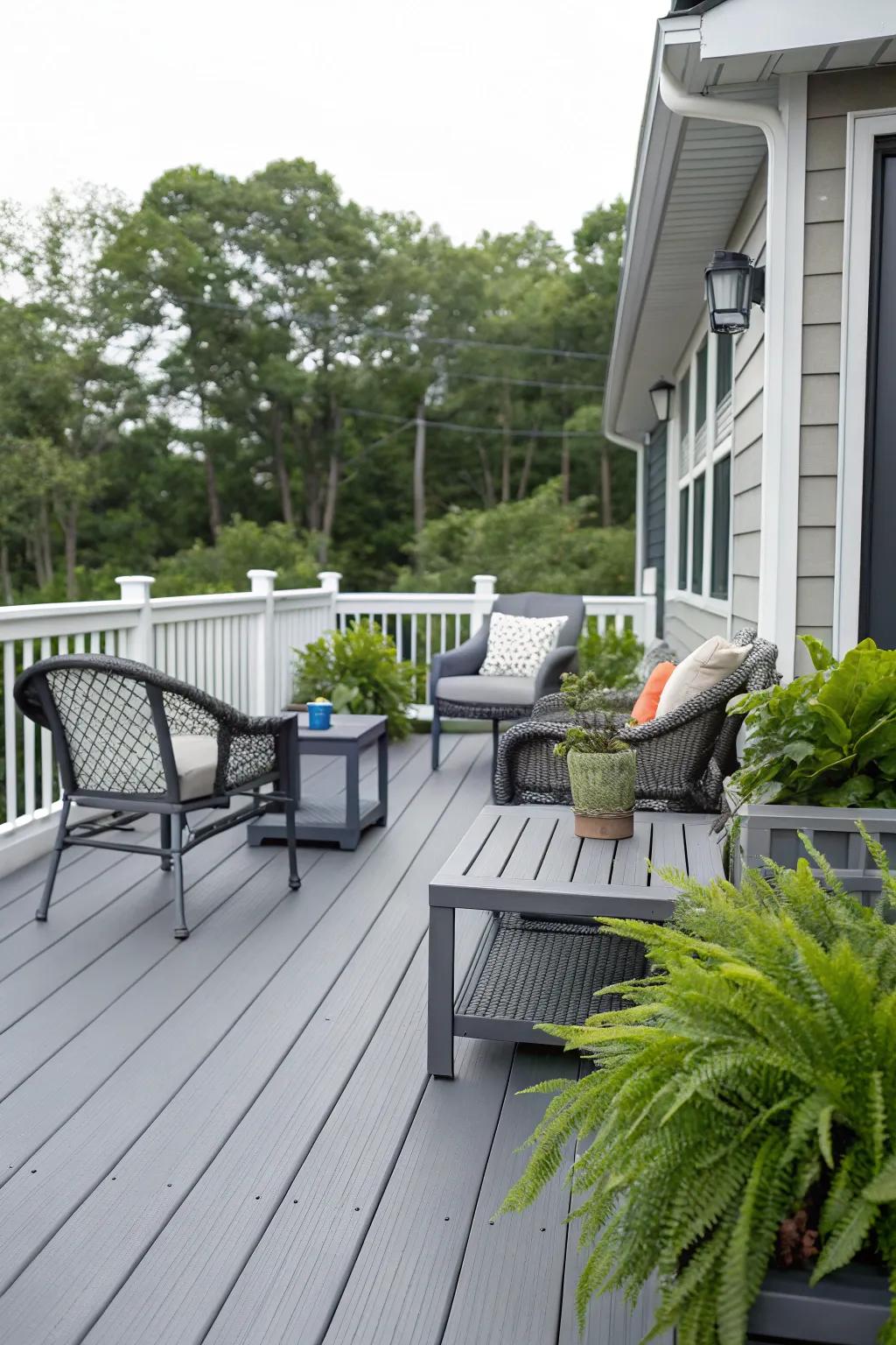 A modern gray-toned deck seamlessly blending with stylish outdoor furniture.