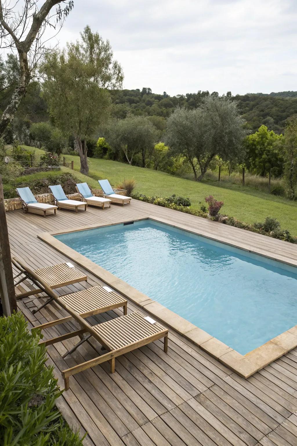 Wood decking brings warmth and a natural vibe to the poolside.