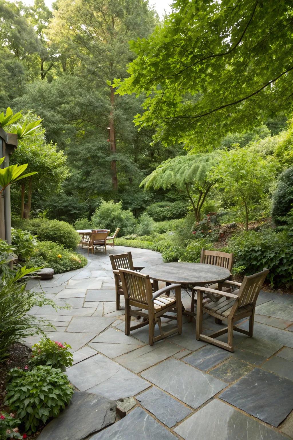 An intimate slate patio showcasing country-style timber seating.