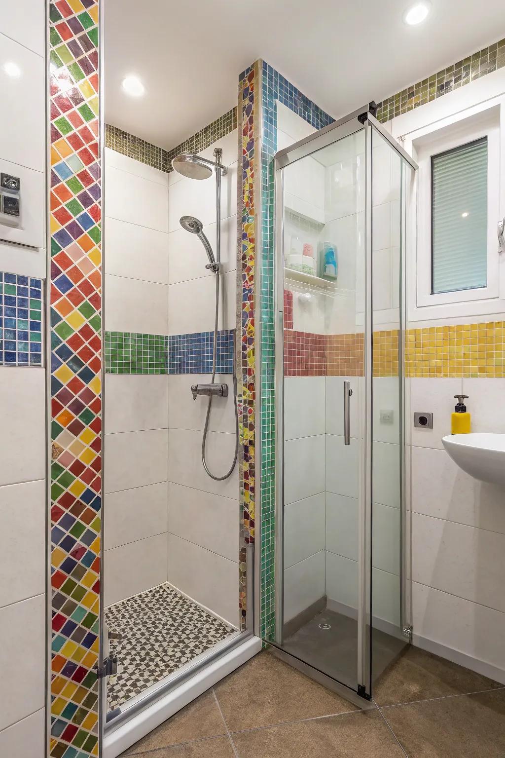 Tile schemes contribute individuality and flair to a small-sized bath shower.