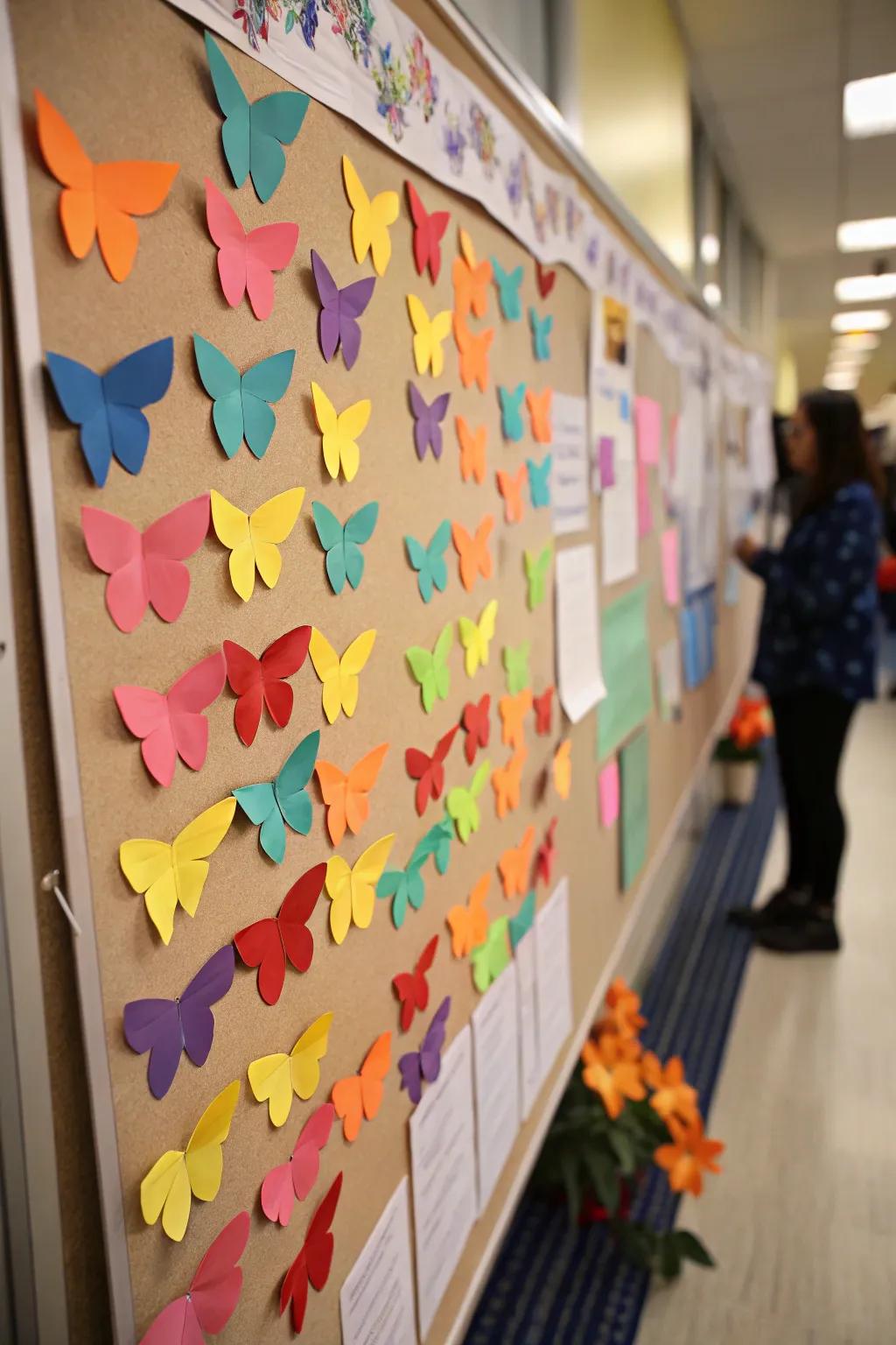 Butterflies bringing a touch of whimsy to the spring bulletin board.