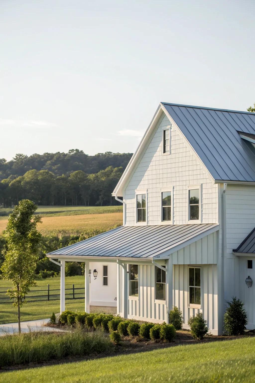 A modern country house featuring white vinyl siding and a polished steel roof.