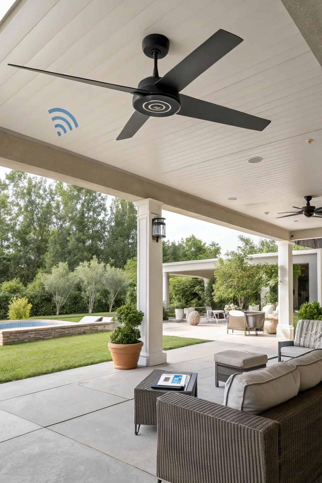 A modern patio featuring a high-tech smart ceiling fan.