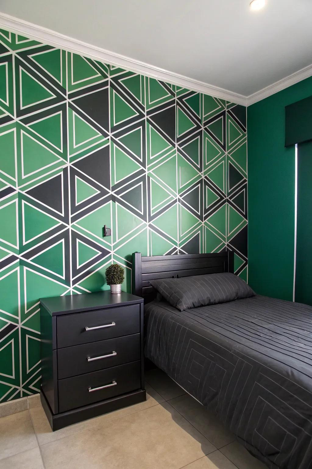 Green and black geometric wallpaper adds a modern edge.
