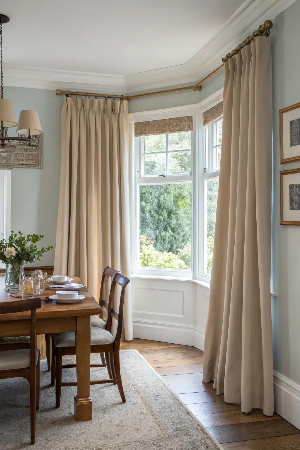 Understated shades of window dressings that enhance a variety of dining room designs.