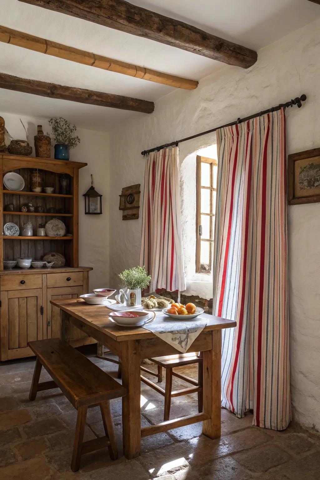 Striped curtains adding charm to a rustic farmhouse dining room.