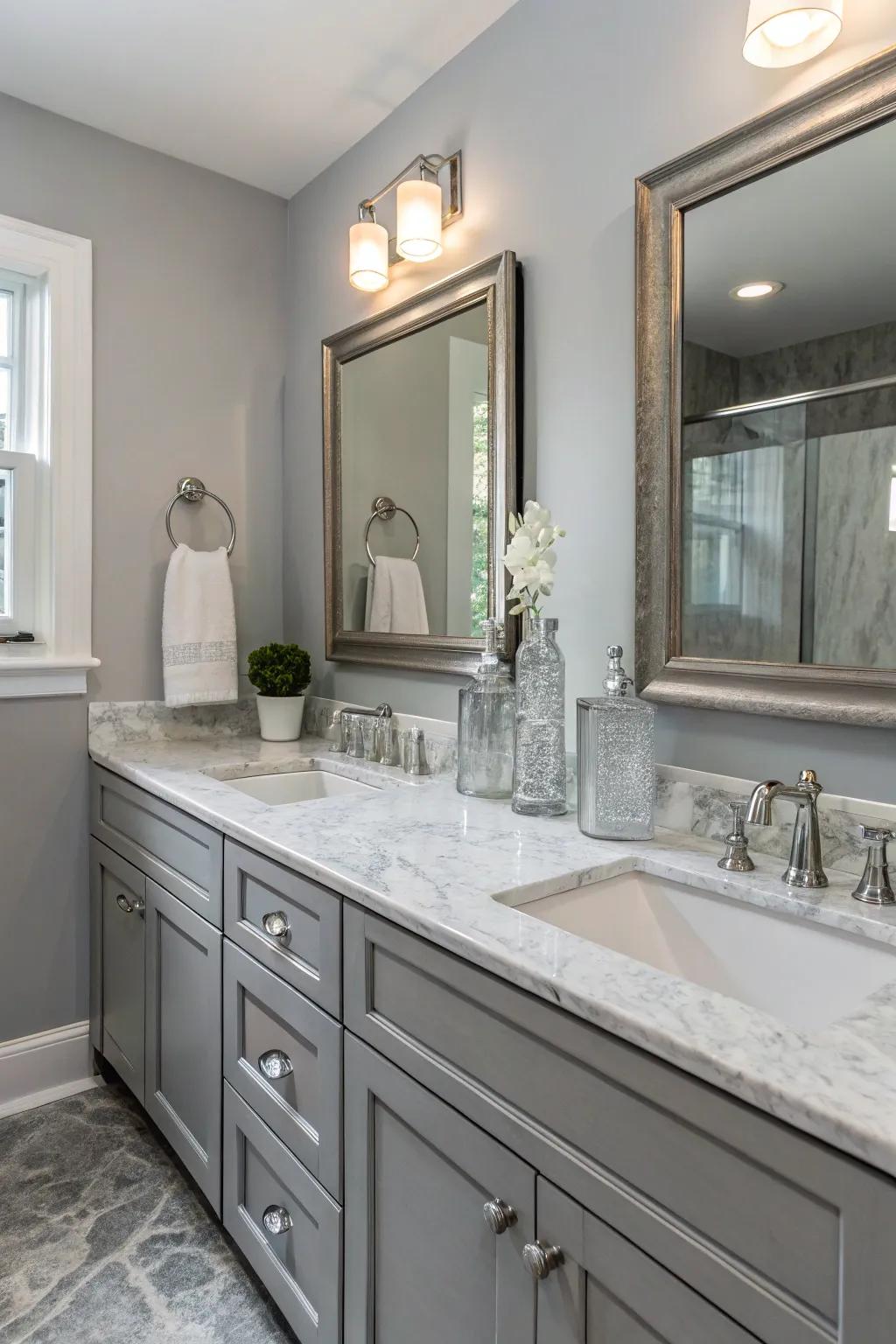 Marble and glass elements bring luxury to the grey bathroom.