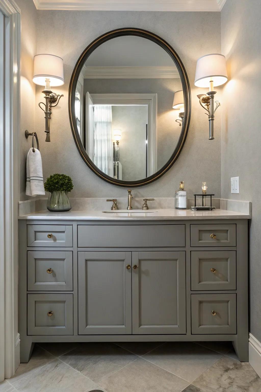 Stylish illumination and a circular mirror uplift the appearance of the grey vanity.