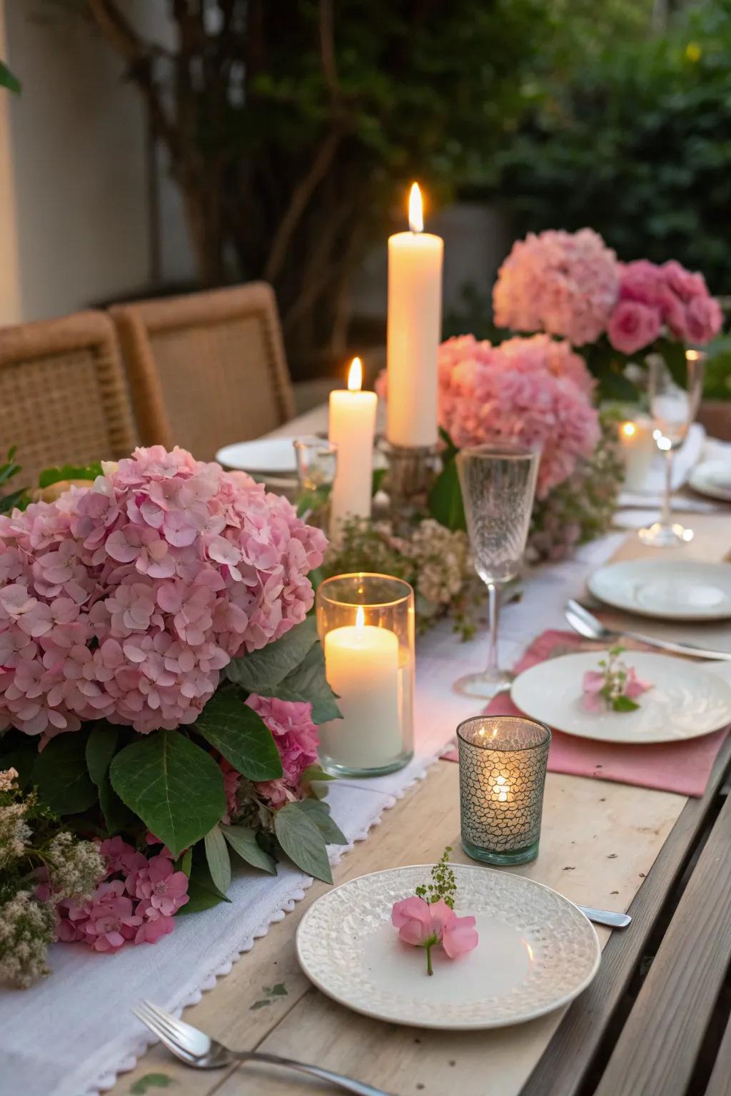 Rose hydrangeas and lights establish the ambiance for a personal meal.