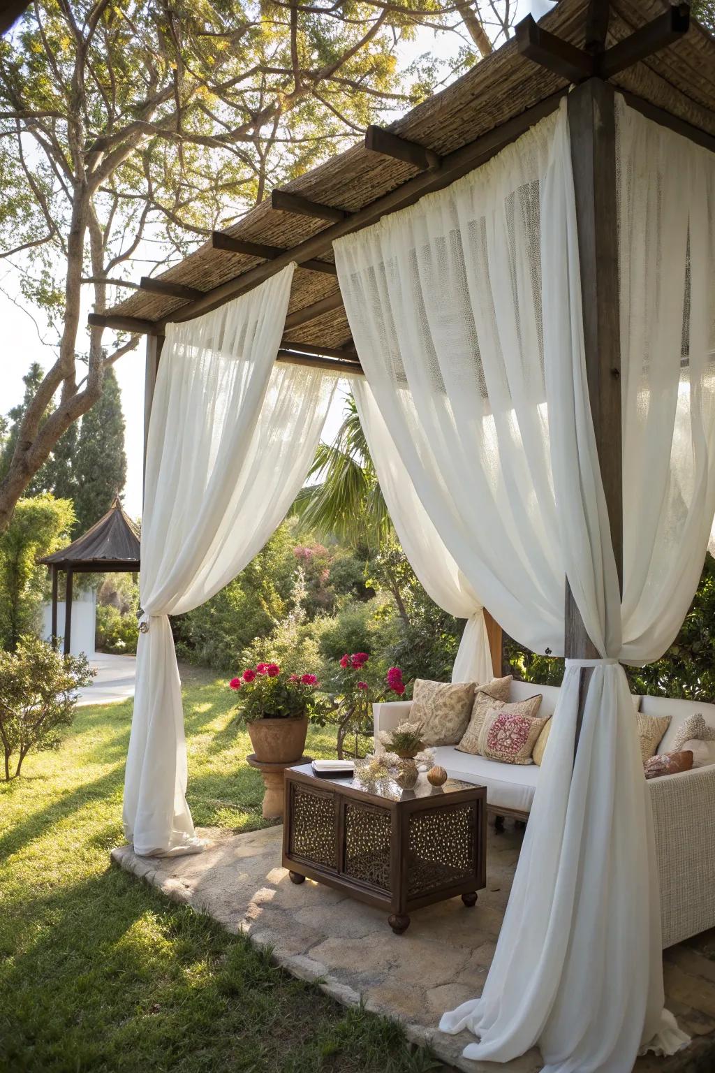 Soft drapes contribute sophistication and seclusion to your open-air setting.