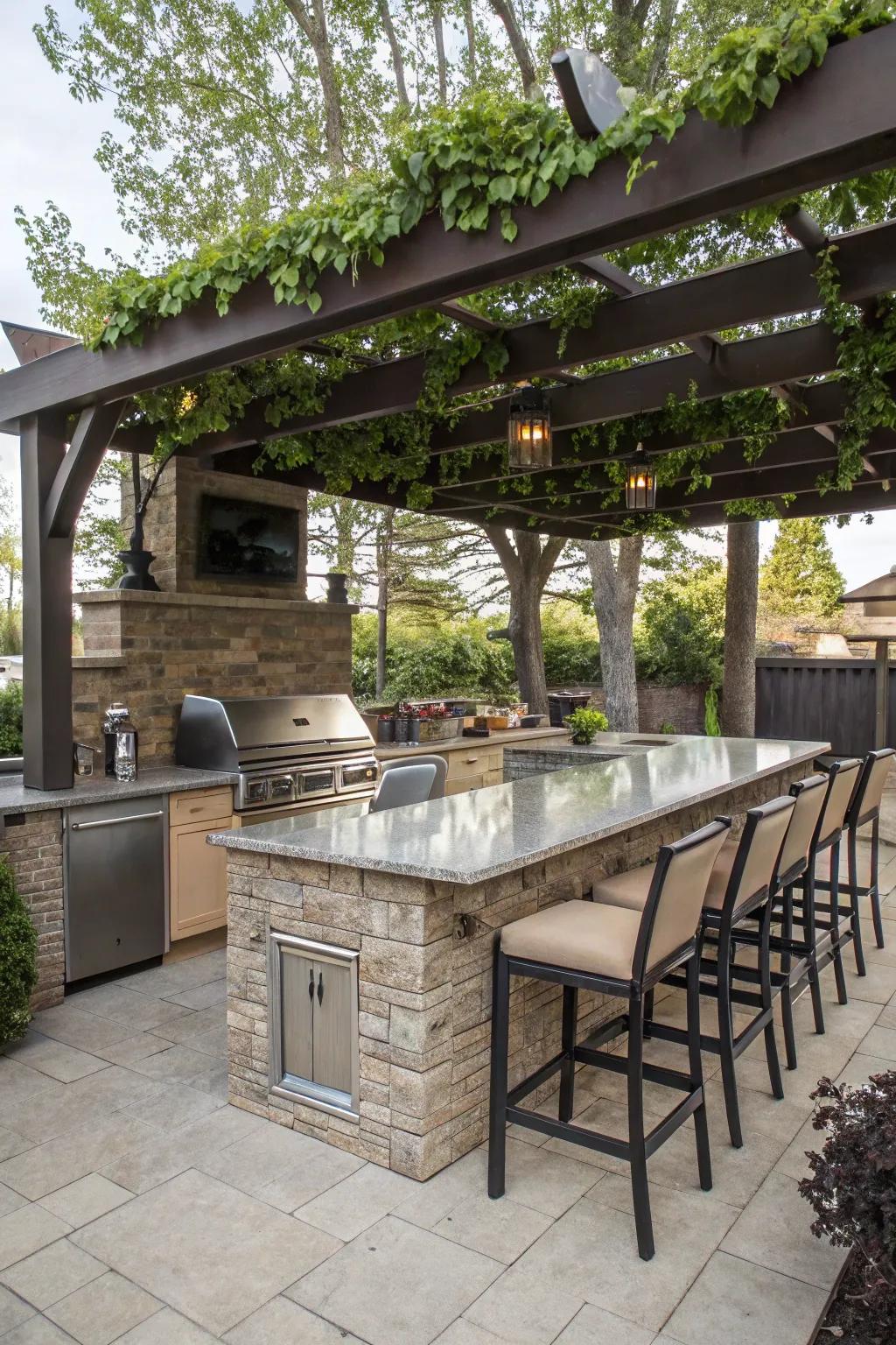 An inviting outdoor cooking area with bar seating and a lounge area beneath a pergola.