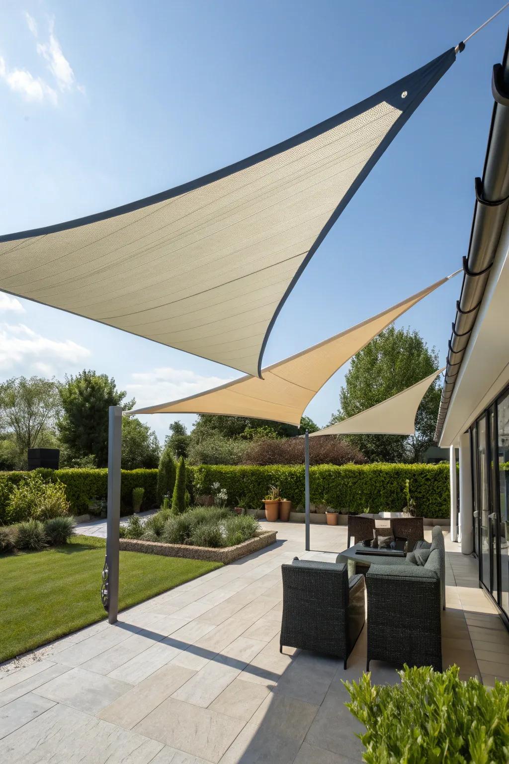 Triangular shades present a modern aesthetic while delivering ample shade.