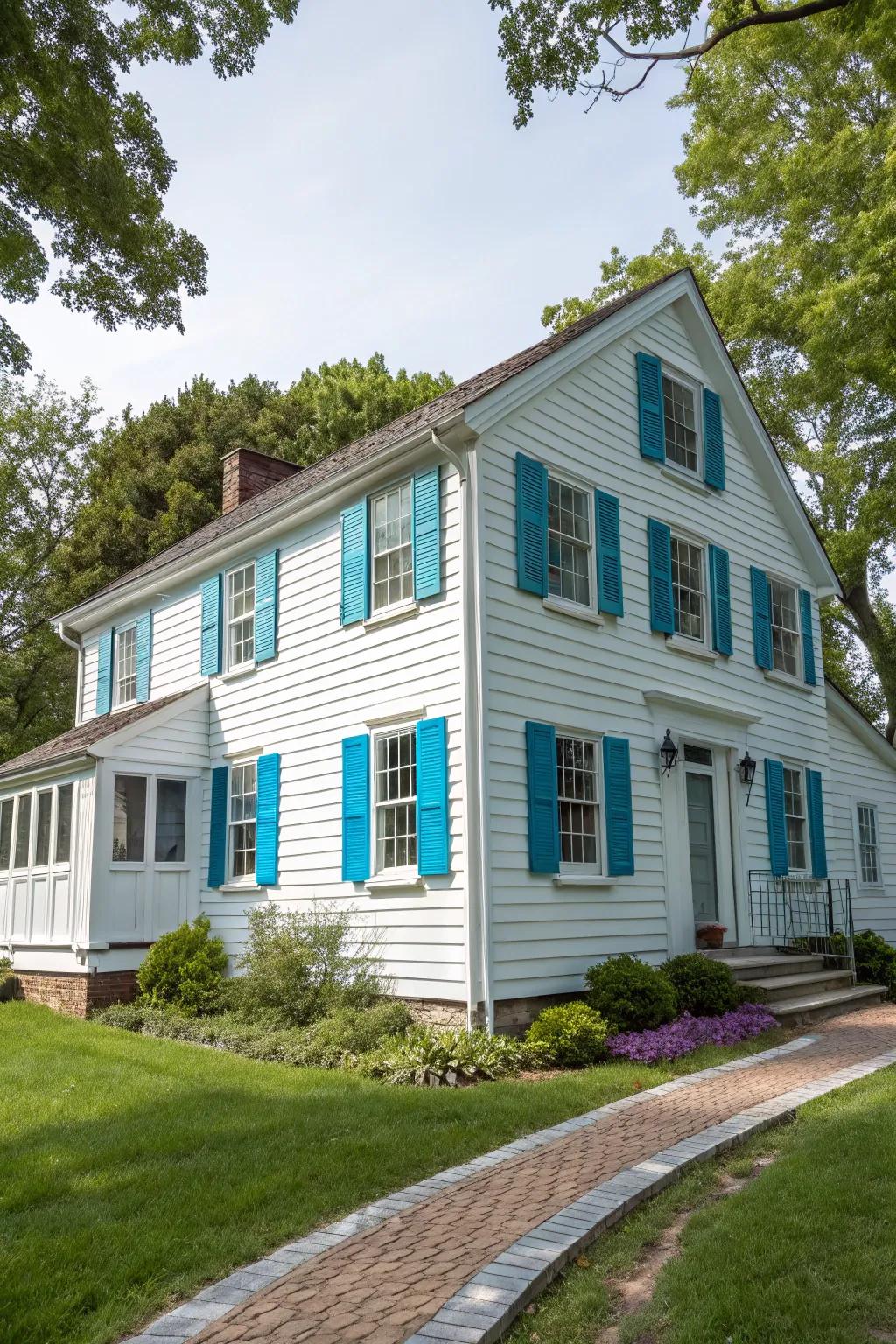 Classic white vinyl siding provides a timeless backdrop for colorful accents.