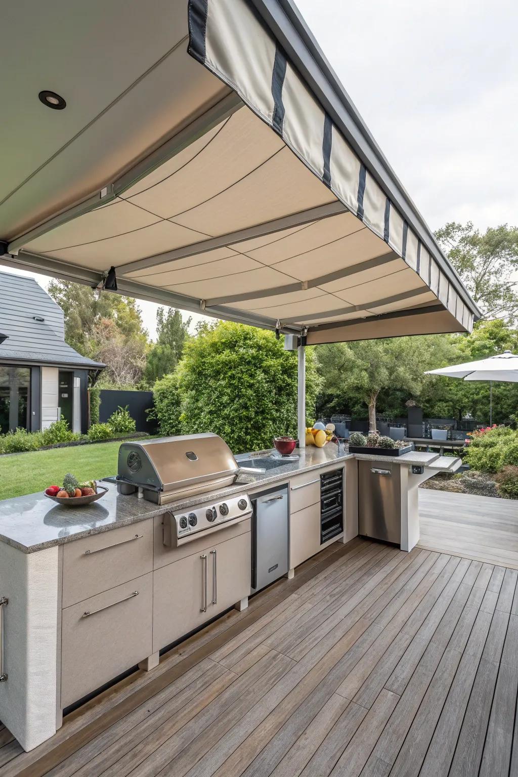 A pull-down canopy furnishes versatile sun or shade solutions for your outdoor kitchen.