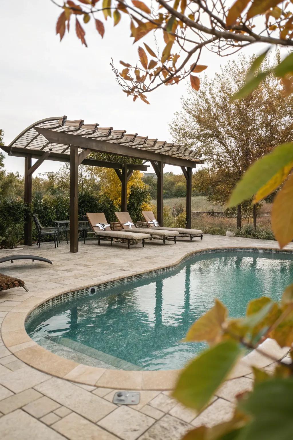 A gazebo offers a perfect shaded seating spot by the pool.