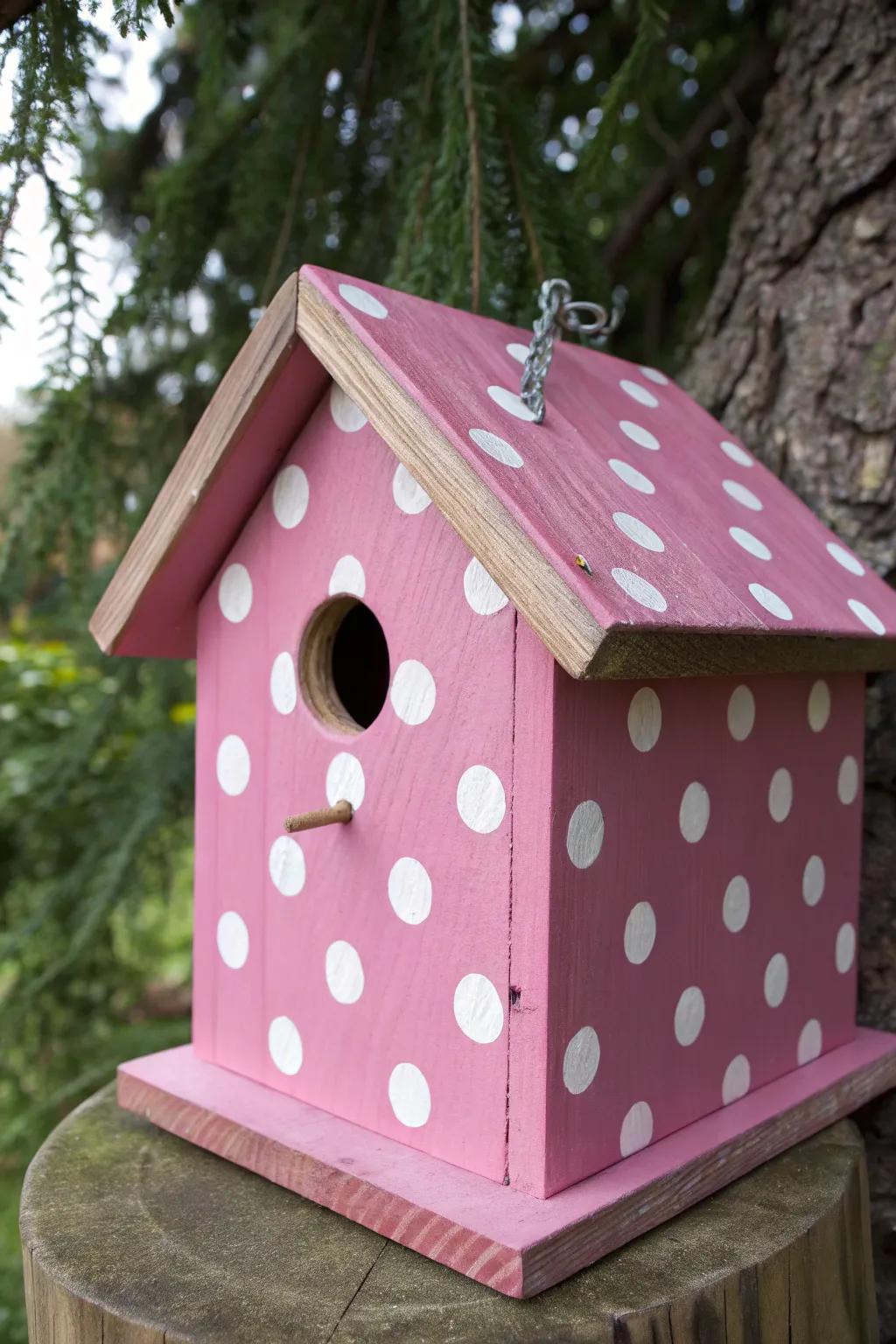 Introduce a dash of whimsy to your garden with this cheerful polka dot birdhouse!