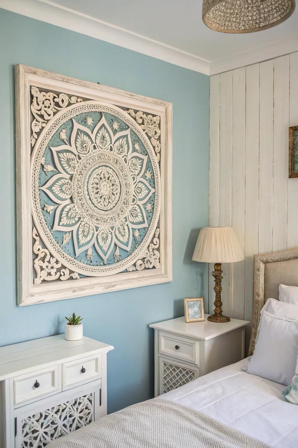 Wall art elevates the visual charm of a blue and white themed bedroom.