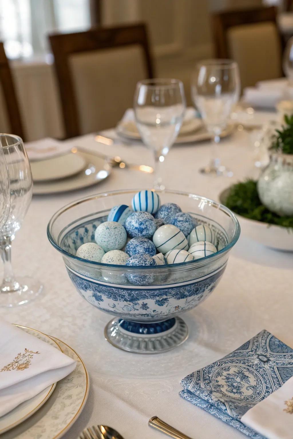 A clear glass bowl elegantly displaying blue and white porcelain