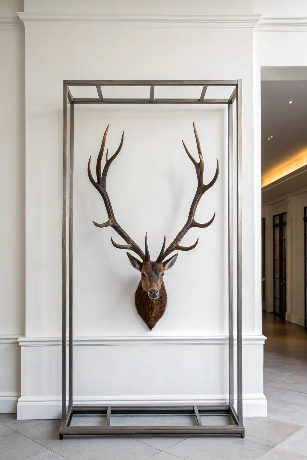 Deer antlers within a sleek metal outline offer a minimalist touch to a contemporary wall.