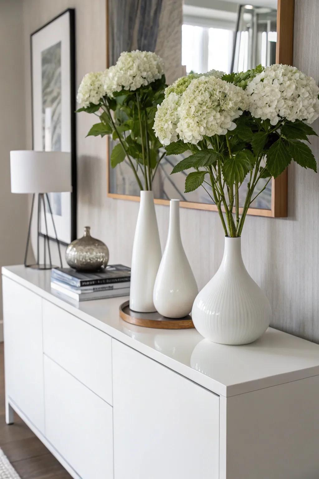Individual hydrangea stalks introduce contemporary simplistic design to a fashionable environment.