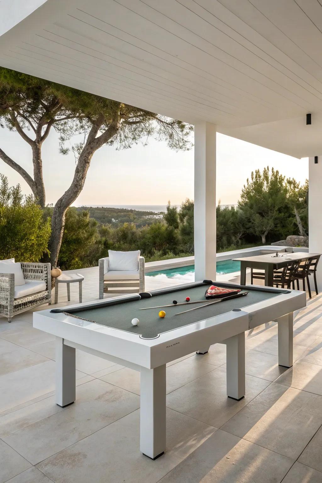 A sleek, modern outdoor pool table arrangement with minimalist furniture.