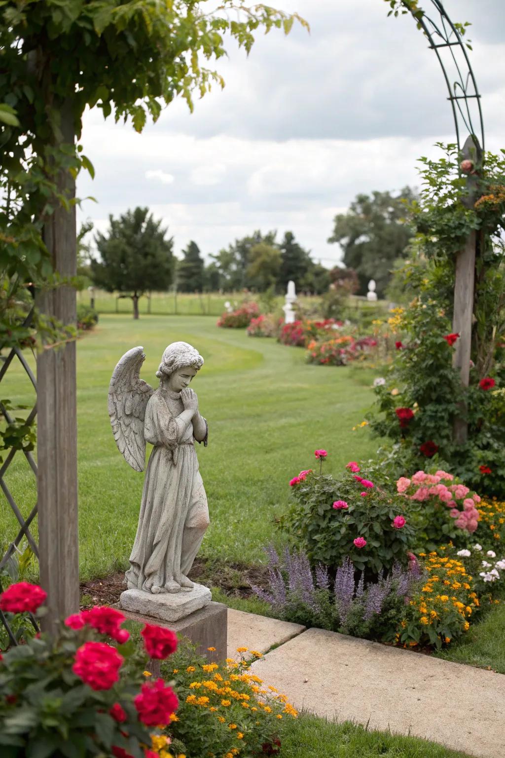 A serene heavenly sculpture contributes a soothing essence to the memorial garden.
