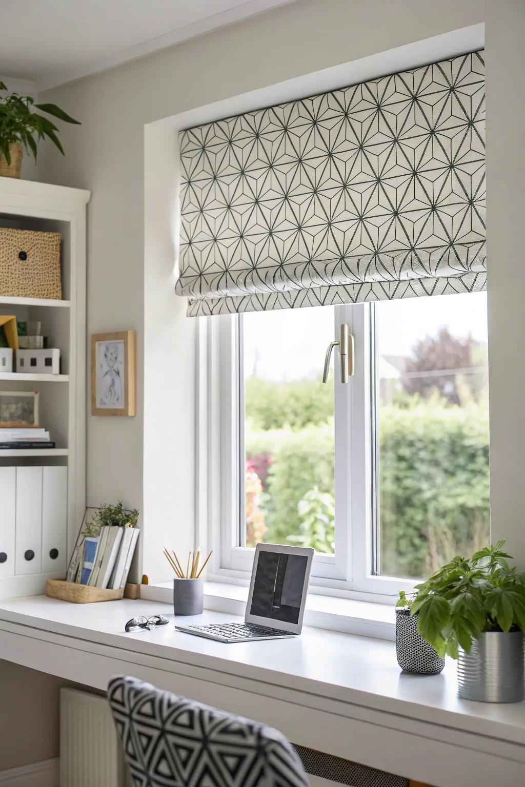 A window enhanced with a shaped pattern treatment in a contemporary work area.