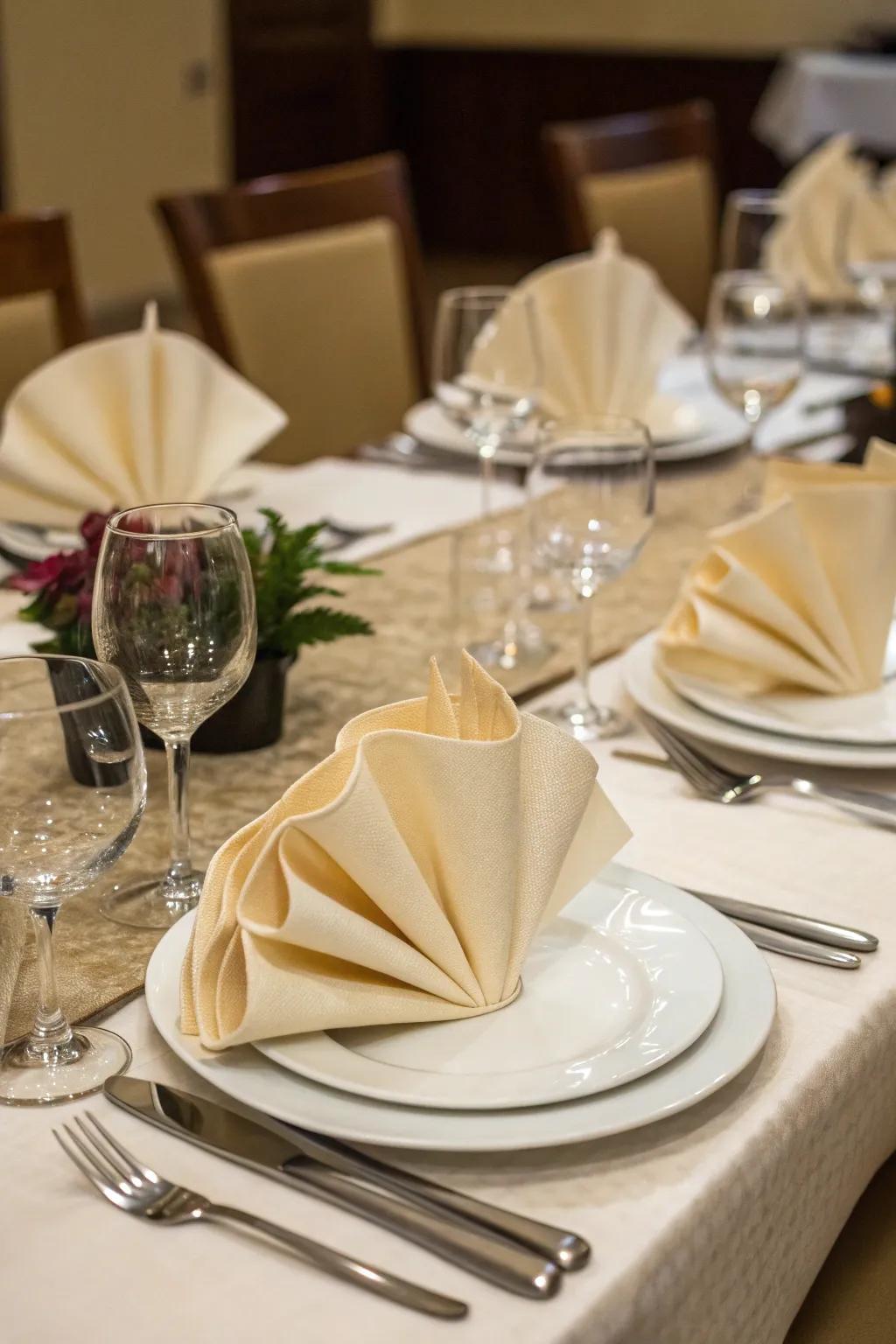 Inventively folded cloths contribute a personal element to the table.