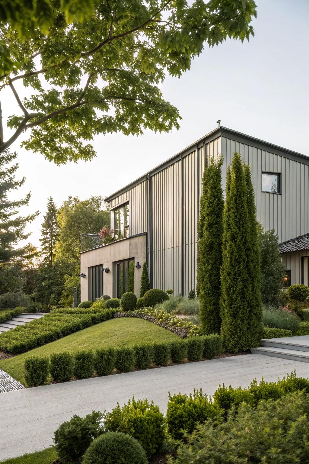 An elegant home featuring vertical metal wall cladding, enhancing its stately presence.
