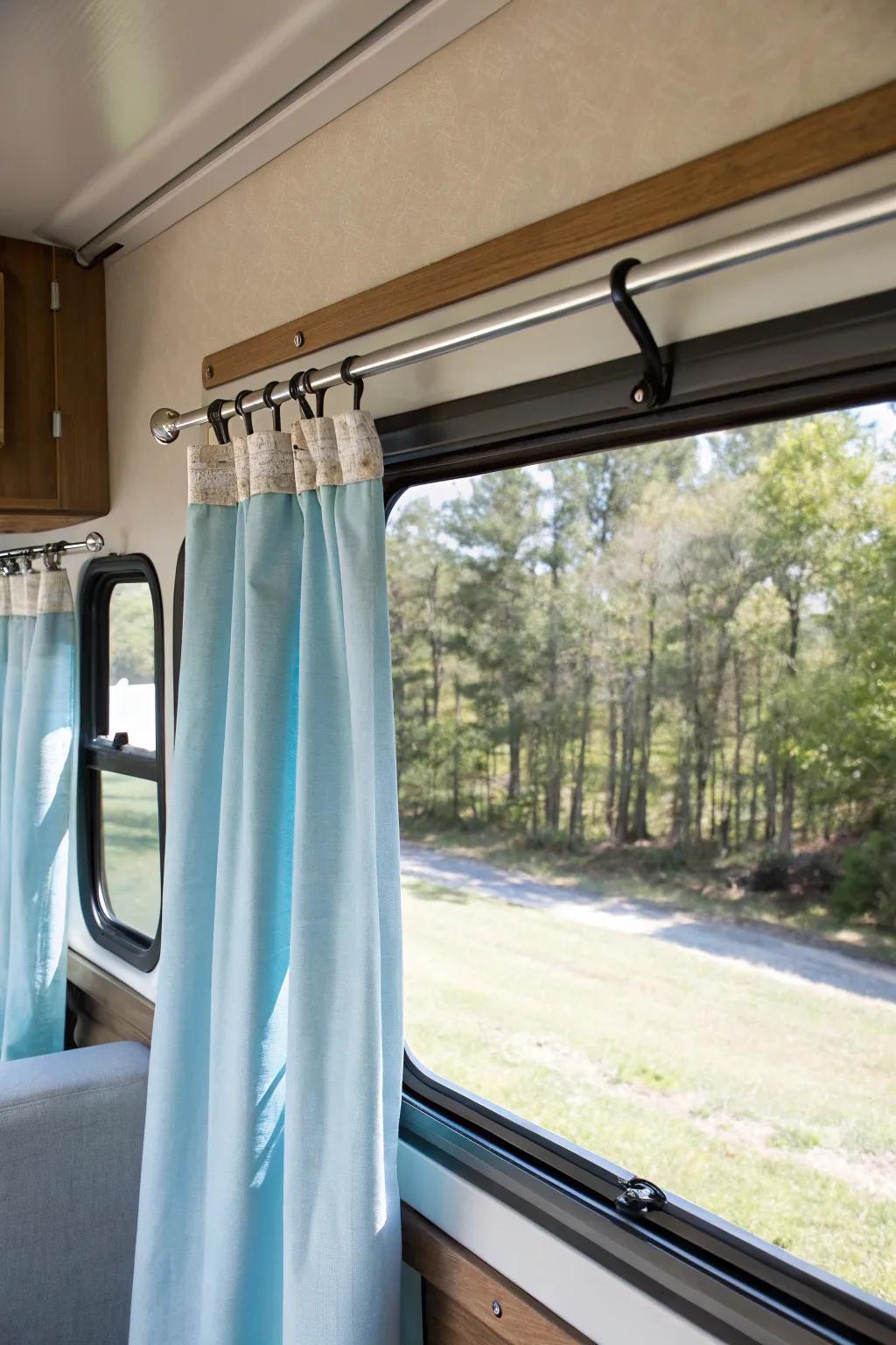 Simple and effective: adhesive hook curtain rods in an RV.