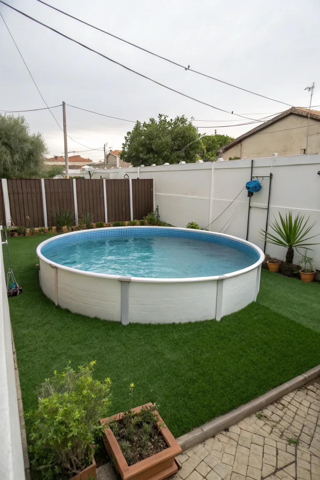 Synthetic grass creating a vibrant and maintenance-free border around an above-ground pool.