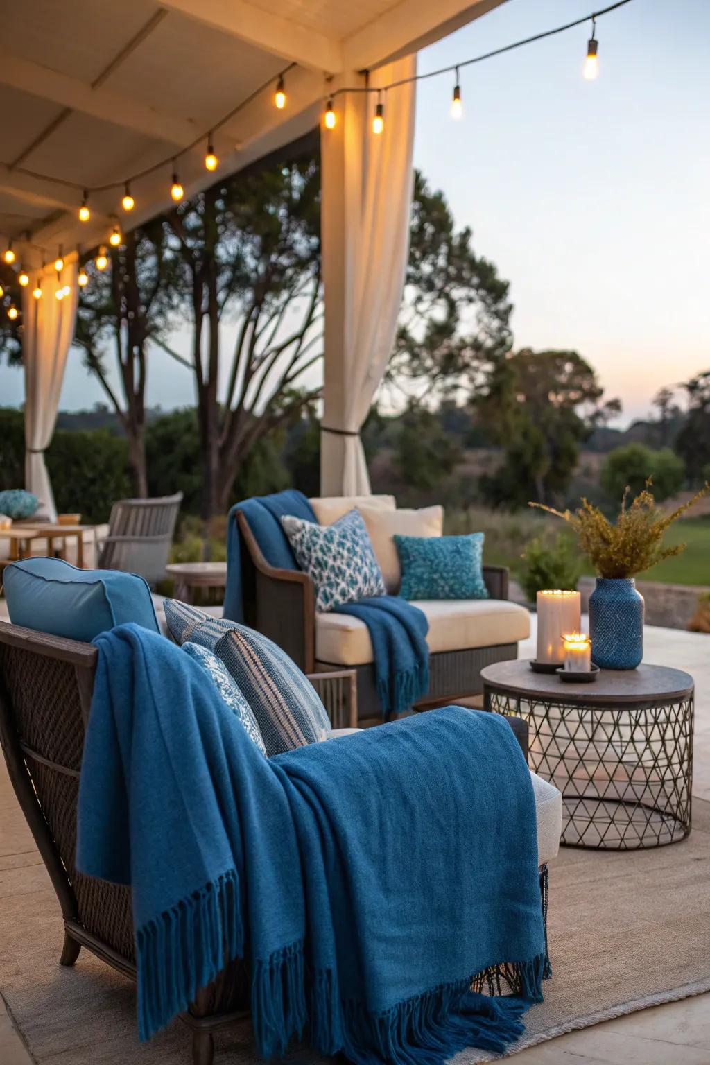 A snug outdoor seating space featuring azure accents.