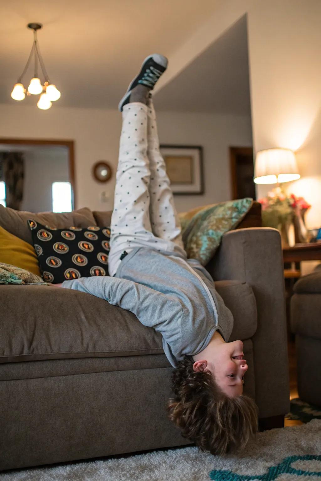 Upside down fun infuses a whimsical twist into your couch pose.