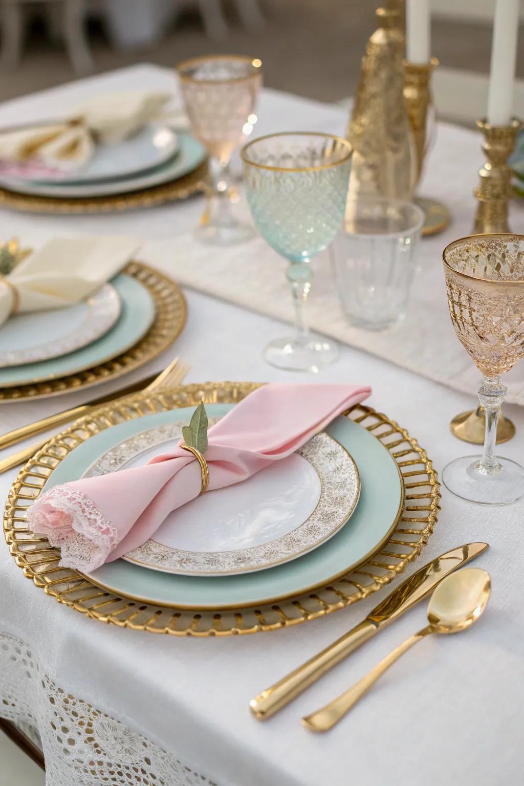 Refined wedding tableware showcasing gold accents and pastel-colored napkins.