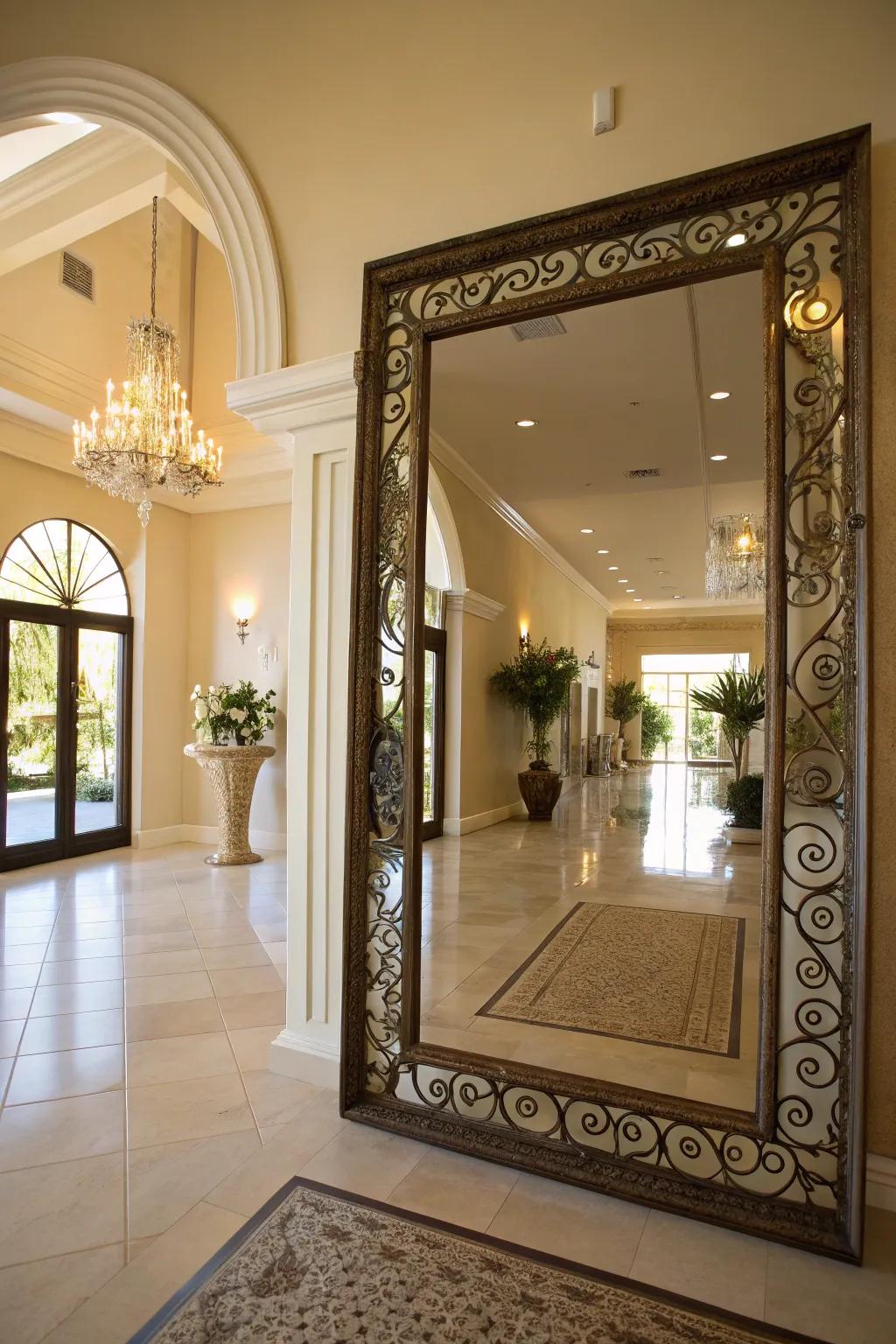 An entryway with a grand decorative mirror that enhances light and establishes spaciousness.