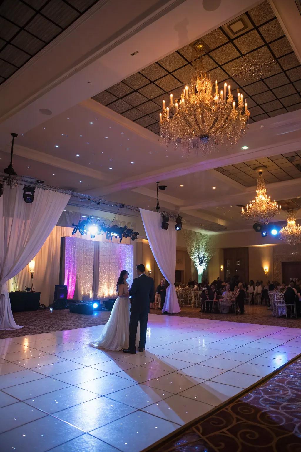 Beams and uplighting drawing consideration to the dance floor.
