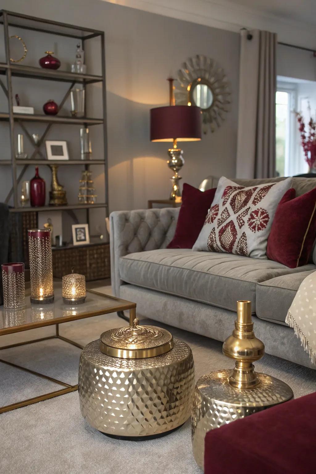 A living space highlighted by metallic highlights set against a grey and wine-red theme.