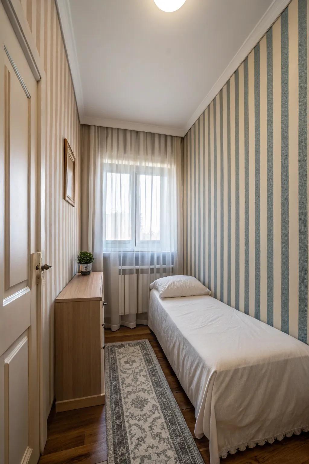 Vertical stripes add height and interest in a narrow bedroom.