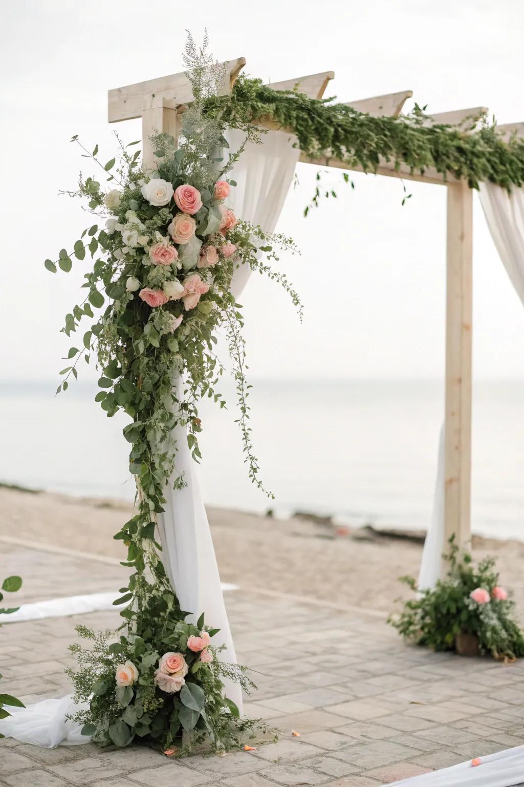 A minimalist arch with verdure and blossoms frames the ceremony beautifully.