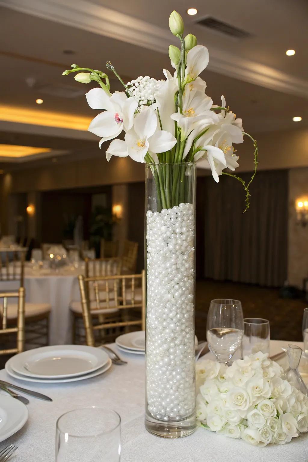 Ivory pearl drops and orchids are ideally suited for refined social events.