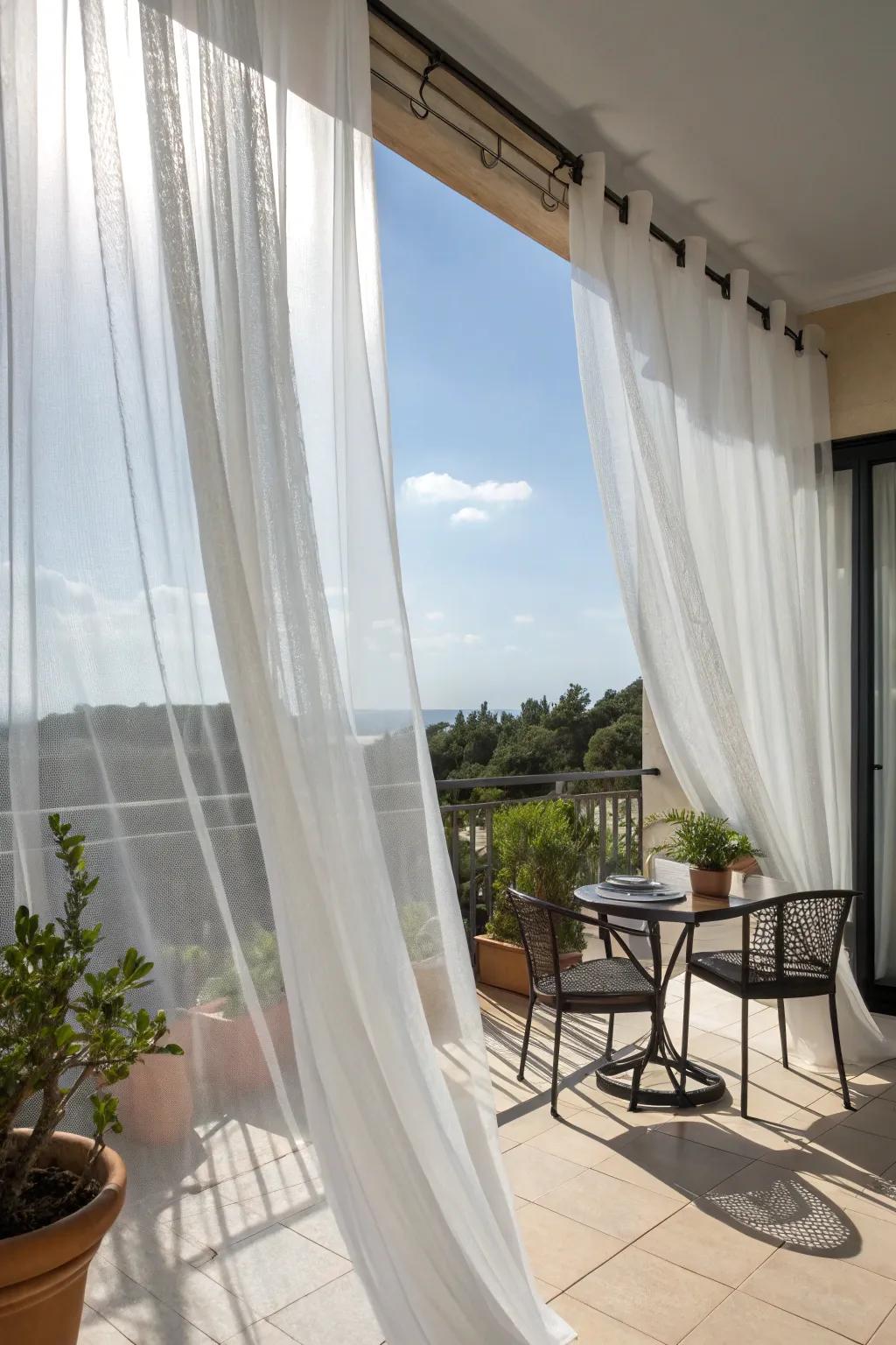 Sheer curtains producing a soft, shaded ambiance on a balcony.